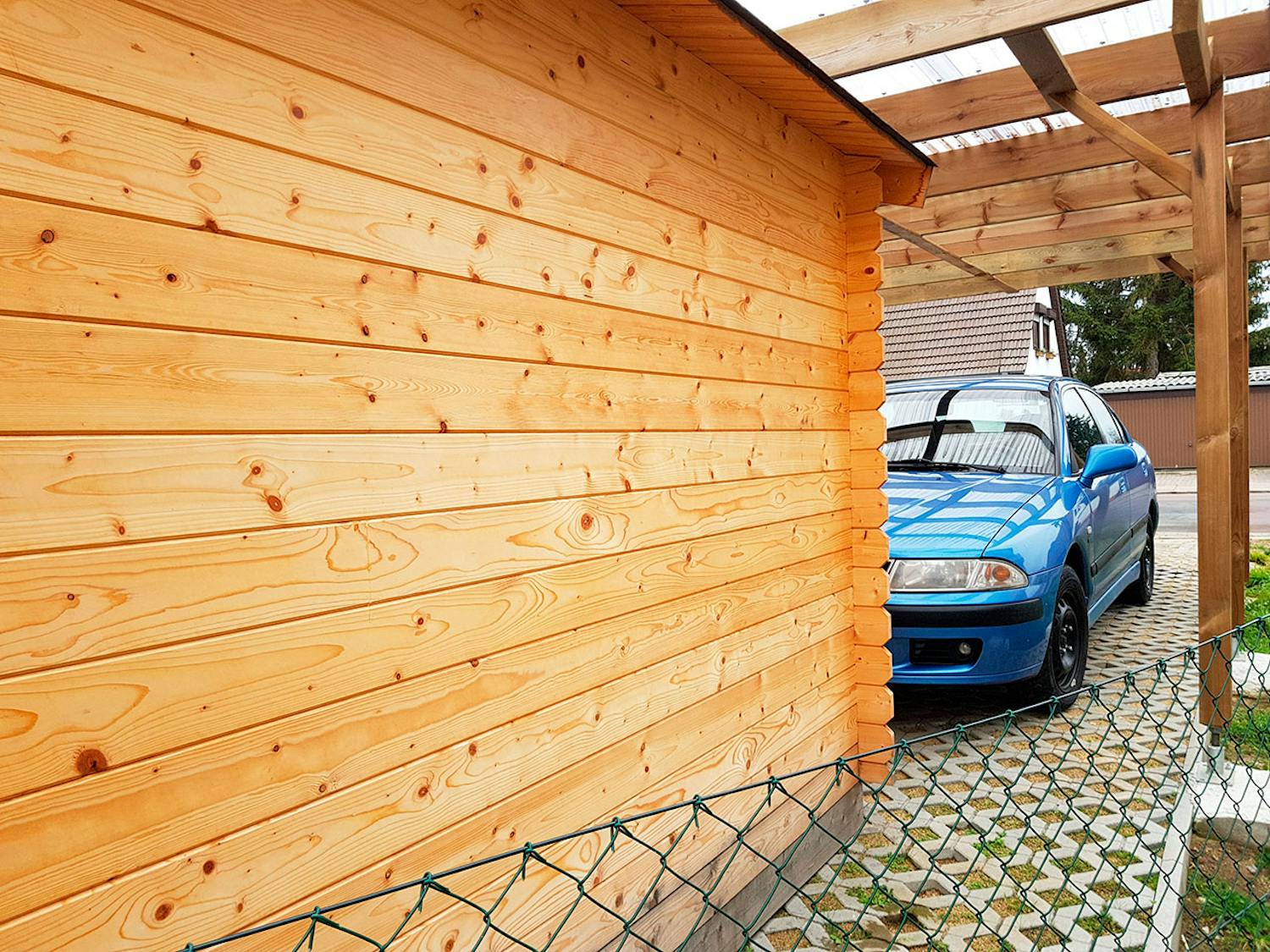 Autotalli katoksella Autokatos vai autotalli?